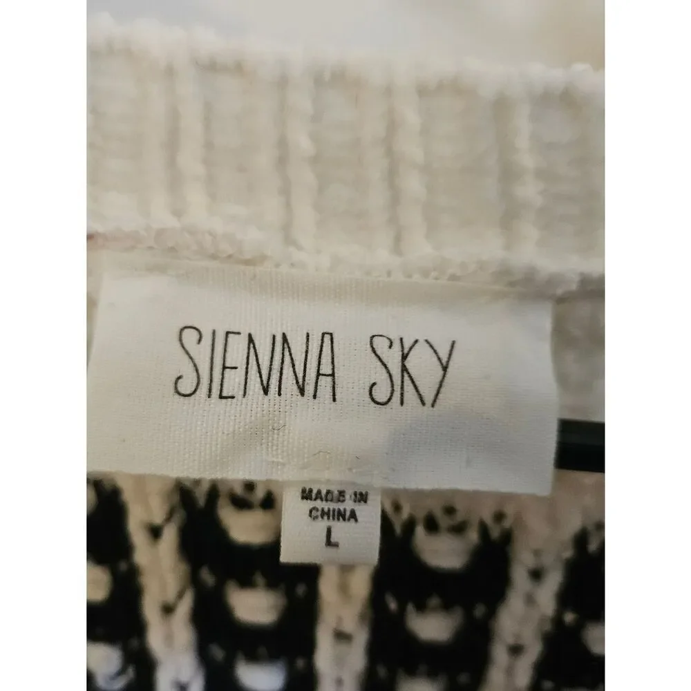 Sienna Sky Cream and Black Open-Front Patterned Knit Cardigan